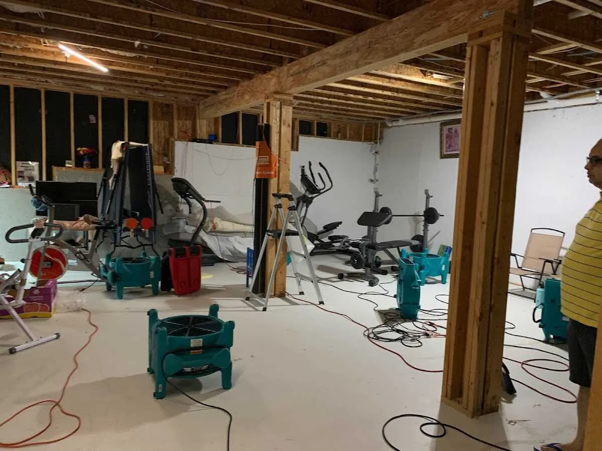 Basement drying equipment setup for Contents Cleaning & Restoration in Helena Valley Southeast